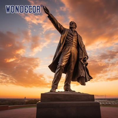 Bronze sculptures of figures in large outdoor square parks