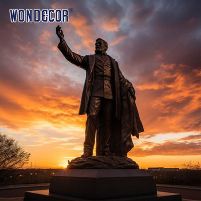 Bronze sculptures of figures in large outdoor square parks